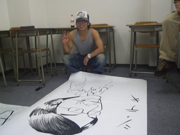 Brown-1 KCP students drawing a caricature of a classmate