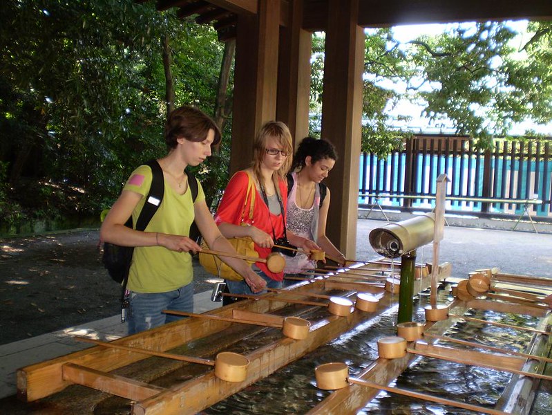KCP students cleansing before entering a temple